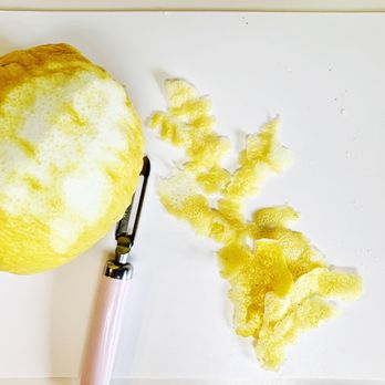J'aime Confiture - a peeled lemon on a cutting board - Specialty Food Near Me - Menlo Park, California J'aime Confiture - a peeled lemon on a cutting board - Specialty Food Near Me - Menlo Park, California