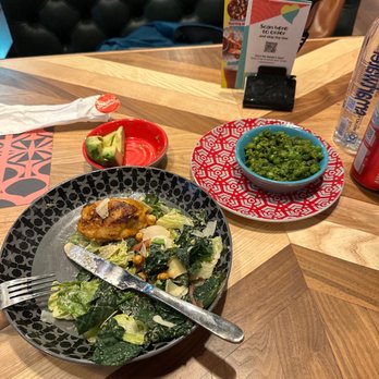 Nando's Peri-Peri - Spicy kale Caesar with chicken thighs and a side of some fancy peas - Chicken Shop Near Me - Alexandria, Virginia Nando's Peri-Peri - Spicy kale Caesar with chicken thighs and a side of some fancy peas - Chicken Shop Near Me - Alexandria, Virginia