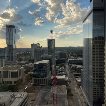 The Headliners Club - a view of a city with skyscrapers - American Near Me - Austin, Texas The Headliners Club - a view of a city with skyscrapers - American Near Me - Austin, Texas