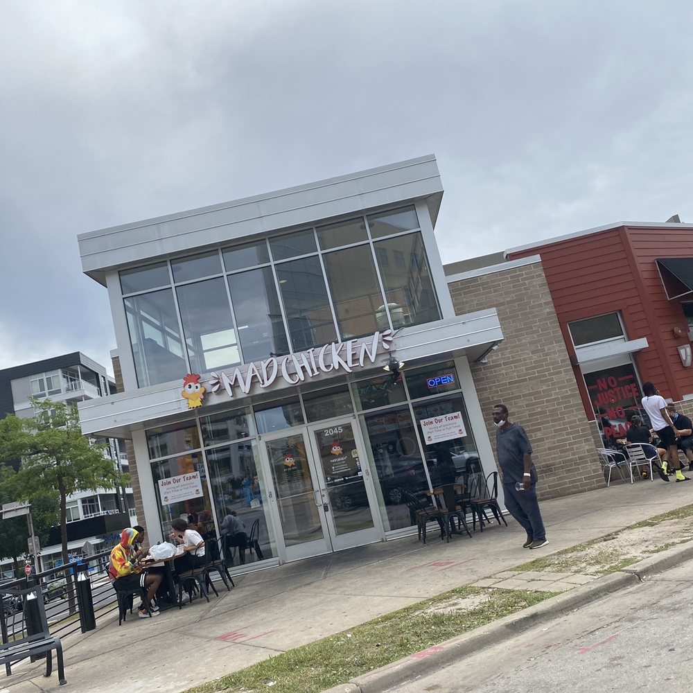 Mad Chicken - people sitting at tables outside a restaurant - Chicken Wings Near Me - Milwaukee, Wisconsin
