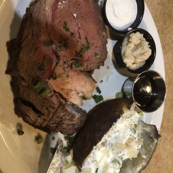 Merchant & Main Grill & Bar - medium rare prime rib, baked potato and real horseradish - Bars Near Me - Vacaville, California Merchant & Main Grill & Bar - medium rare prime rib, baked potato and real horseradish - Bars Near Me - Vacaville, California