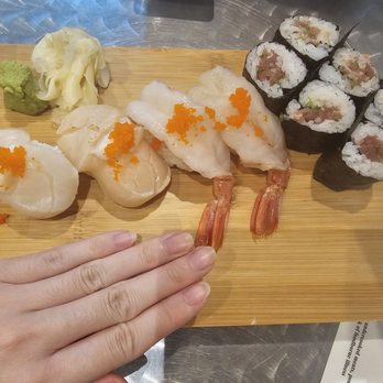 Musashi’s - The pieces are huge. Hand for reference - Sushi Bars Near Me - Corona, California