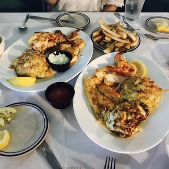 By The Docks Restaurant - Two seafood platter! We love the crab cakes! - Seafood Near Me - Middle River, Maryland