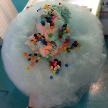 Shock Ice Cream & Dessert Cafe - Cotton Candy wrapped cone with Cotton Candy and chocolate candy sprinkles - Ice Cream & Frozen Yogurt Near Me - Westhampton Beach, New York Shock Ice Cream & Dessert Cafe - Cotton Candy wrapped cone with Cotton Candy and chocolate candy sprinkles - Ice Cream & Frozen Yogurt Near Me - Westhampton Beach, New York