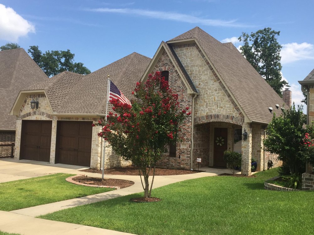 Slide of Texas Grand Roofing