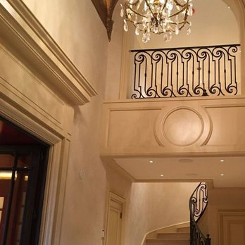 Daigle Construction - a staircase and chandelier in a home - General Contractors Near Me - Petaluma, California Daigle Construction - a staircase and chandelier in a home - General Contractors Near Me - Petaluma, California
