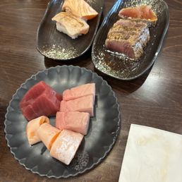 Top left: seared salmon Top right: A3. Sea Steak Bottom: Blue Fin (?(