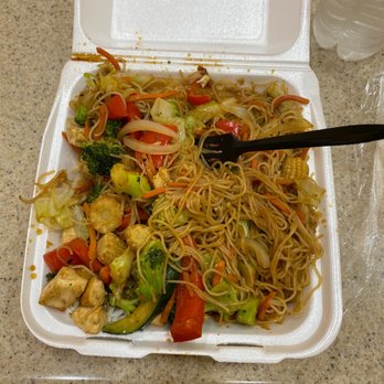 Okee Dokee Grill - a take out container with noodles and vegetables - American Near Me - Puyallup, Washington
