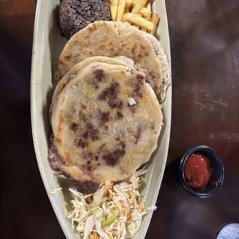 Reinas De Las Pupusas Restaurant - R Revueltas Asada con Quezo rice mixed with beans and fries - Salvadoran Near Me - Phoenix, Arizona Reinas De Las Pupusas Restaurant - R Revueltas Asada con Quezo rice mixed with beans and fries - Salvadoran Near Me - Phoenix, Arizona