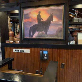 LongHorn Steakhouse - a picture of a cowboy on a horse - Steakhouses Near Me - Beavercreek, Ohio