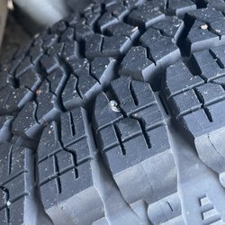 Les Schwab Tire Center - Tire with the screw in it.