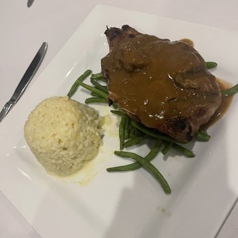 The Union Kitchen - Bone in pork chop - New American Near Me - Kingwood, Texas