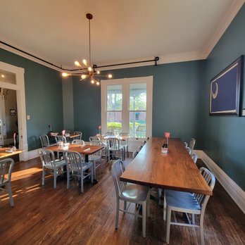 Biscuit Love - Franklin - a dining room with blue walls and wood floors - Breakfast & Brunch Near Me - Franklin, Tennessee