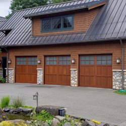 Rainier Garage Door - Love the look of wood? Doesn't get much better than this for garage doors that look like wood and perform and look amazing.
