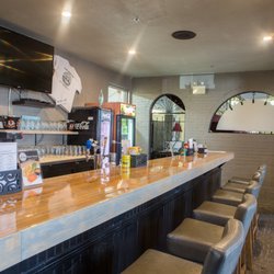 Stuft Burger Bar & Poutinerie - Our bar! Built from reclaimed wood! (It's a bowling lane)