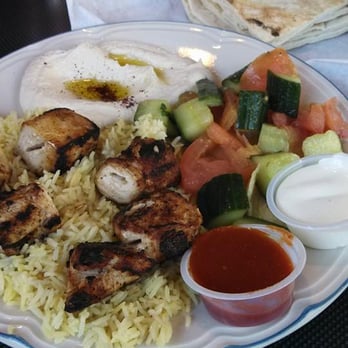 Palmyra - Hummas, Pita, Tomato & Cucumber Salad, Rice and Chicken - Mediterranean Near Me - San Francisco, California Palmyra - Hummas, Pita, Tomato & Cucumber Salad, Rice and Chicken - Mediterranean Near Me - San Francisco, California