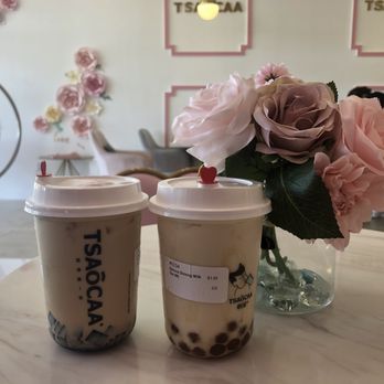 Tsaocaa - Two teas! Both medium size. One is the Sakura Oolong and I believe the one on the left is rose milk with brown sugar jelly. - Bubble Tea Near Me - Jacksonville, Florida Tsaocaa - Two teas! Both medium size. One is the Sakura Oolong and I believe the one on the left is rose milk with brown sugar jelly. - Bubble Tea Near Me - Jacksonville, Florida
