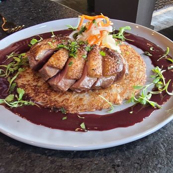 Mandrake - Duck breast over crispy coconut rice with a cherry jerk sauce. 10/10 - Tapas/Small Plates Near Me - Geneva, Illinois