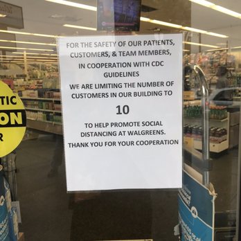 Walgreens - a sign in the window of a store - Drugstores Near Me - Freeport, New York Walgreens - a sign in the window of a store - Drugstores Near Me - Freeport, New York