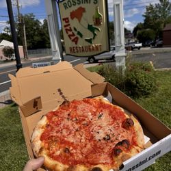 Rossini's Italian Restaurant & Pizza - Sauce and grated cheese