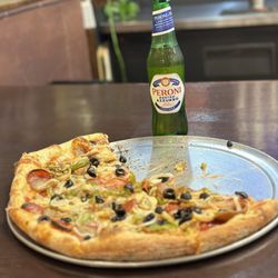 Capo's Pizzeria - Pizza and beer. Nothing better.