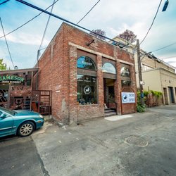 Truffle Pig Trading Co. - Old Brick Building between Astro and The D&D