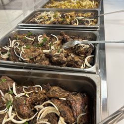 Caribbean Cravings - Jerk chicken, oxtails. Mac n cheese, curry chicken