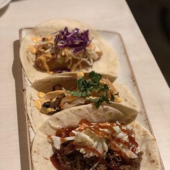 The Peached Tortilla - Taco trio! They're all amazing, but if you can only choose one, I'd recommend the banh mi one. $13 - Asian Fusion Near Me - Austin, Texas The Peached Tortilla - Taco trio! They're all amazing, but if you can only choose one, I'd recommend the banh mi one. $13 - Asian Fusion Near Me - Austin, Texas