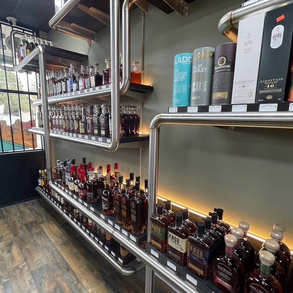 Neil Road Vape Shop - shelves of liquor in a liquor store - Beer, Wine & Spirits Near Me - Reno, Nevada Neil Road Vape Shop - shelves of liquor in a liquor store - Beer, Wine & Spirits Near Me - Reno, Nevada