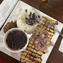 Boneless Breast with Rice and a black Beans and Sweet Plantains. Boneless Breast with Rice and a black Beans and Sweet Plantains.