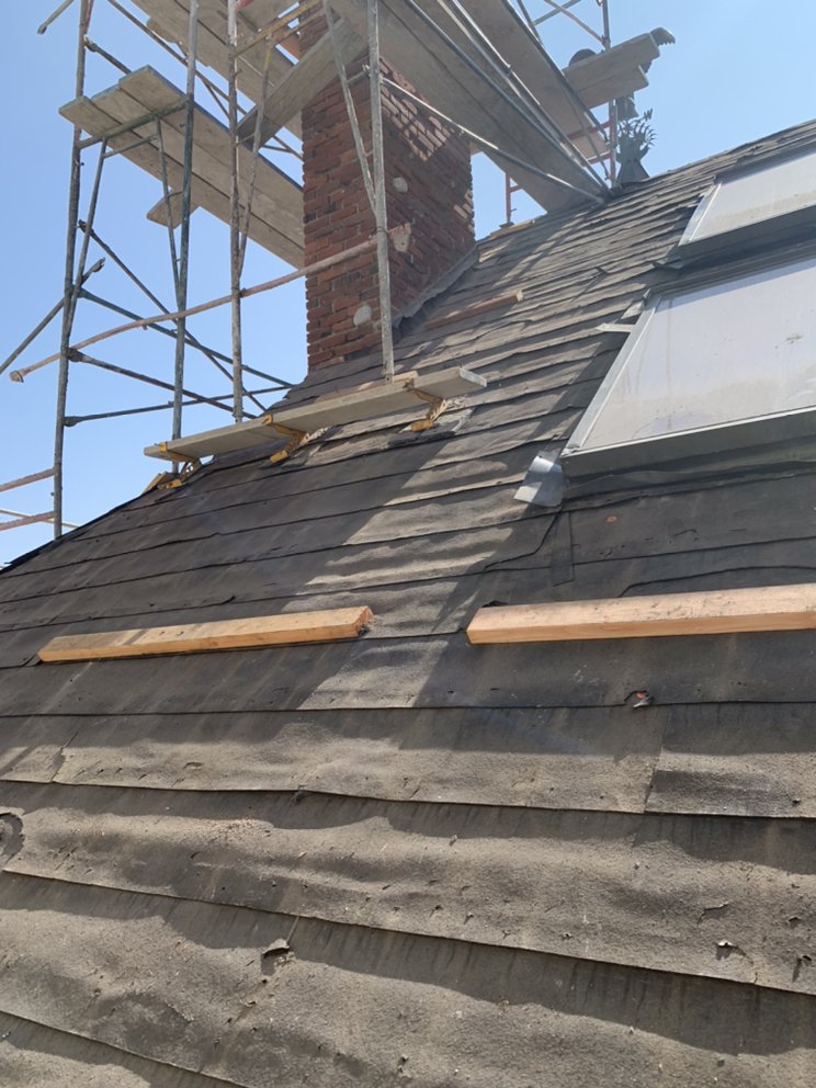 Slide of Juvens Roofing