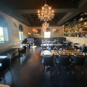 Curiouser Coffee & Conservatory - Inside Dinning Area - Coffee & Tea Near Me - Apple Valley, Minnesota