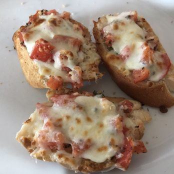 Tuscany Italian Grill - Bruschetta (there comes more on the plate but everyone grabbed one before I could get a picture) - Italian Near Me - Danville, Virginia Tuscany Italian Grill - Bruschetta (there comes more on the plate but everyone grabbed one before I could get a picture) - Italian Near Me - Danville, Virginia