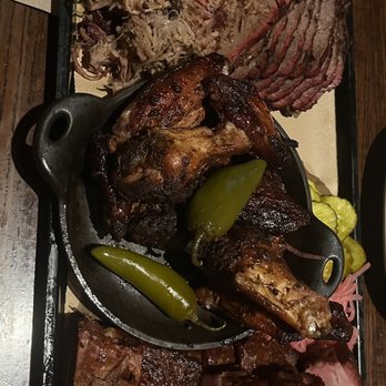 Jack Stack Barbecue - Freight House - The bbq platter for 4.  Ribs, pulled pork, brisket and smoked wings. - Barbeque Near Me - Kansas City, Missouri