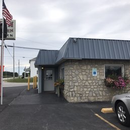 a car parked in front of the inn