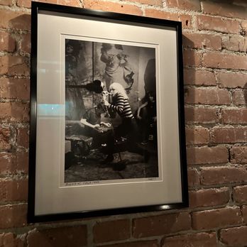 Nightcap - a black and white photograph of a man and a woman - Lounges Near Me - San Luis Obispo, California