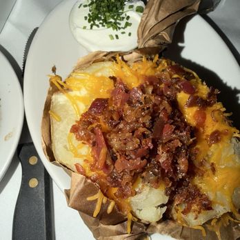 Sam's Steakhouse - Baked potato comes with every steak - Steakhouses Near Me - Saint Louis, Missouri Sam's Steakhouse - Baked potato comes with every steak - Steakhouses Near Me - Saint Louis, Missouri