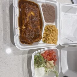 Burrito and side of guacamole. Burrito and side of guacamole.
