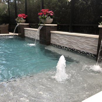Landshark Pools - Beautiful water features really bring tranquility to your pool. - Pool Cleaners Near Me - Orlando, Florida