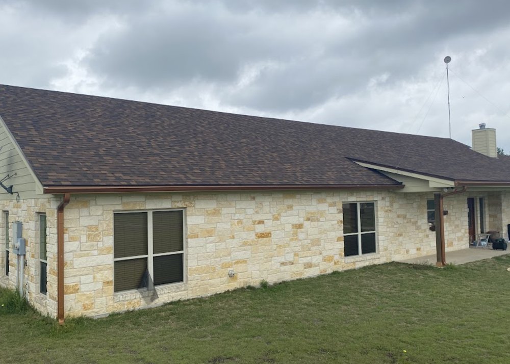 Slide of Havard Roofing