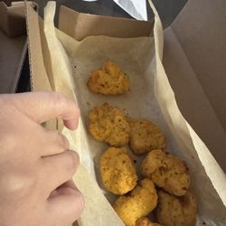 Domino's Pizza - No sauce with my wings as it arrived