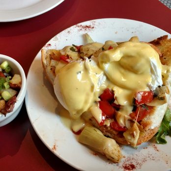 Cafe Conti - Eggs Benedict with Shrimp, Tomatoes, Artichokes & Potatoes - Breakfast & Brunch Near Me - New Orleans, Louisiana Cafe Conti - Eggs Benedict with Shrimp, Tomatoes, Artichokes & Potatoes - Breakfast & Brunch Near Me - New Orleans, Louisiana