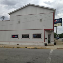 Outside, door on right. Outside, door on right.
