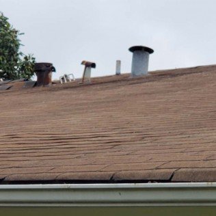 Slide of Bad Storm Roofing and Restoration