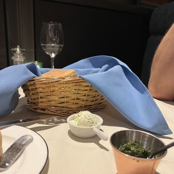 Libertango Steakhouse - Bread basket, herb butter, chimchurry - Steakhouses Near Me - Sandy, Utah Libertango Steakhouse - Bread basket, herb butter, chimchurry - Steakhouses Near Me - Sandy, Utah