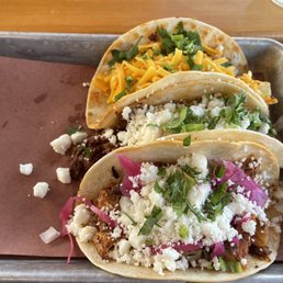 Fish taco, marinated steak taco and chorizo, egg and cheese taco Fish taco, marinated steak taco and chorizo, egg and cheese taco