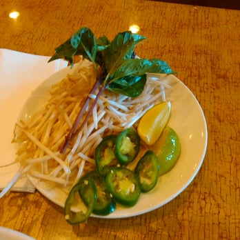Pho & Grill Gaithersburg - Basil, lime, peppers, and bean sprouts. - Vietnamese Near Me - Gaithersburg, Maryland Pho & Grill Gaithersburg - Basil, lime, peppers, and bean sprouts. - Vietnamese Near Me - Gaithersburg, Maryland