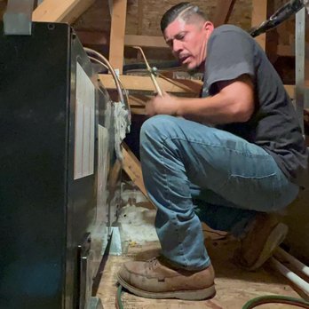 West Country HVAC - Installer Manuel, brazing copper lines on a furnace. - Heating & Air Conditioning/HVAC Near Me - Hesperia, California West Country HVAC - Installer Manuel, brazing copper lines on a furnace. - Heating & Air Conditioning/HVAC Near Me - Hesperia, California