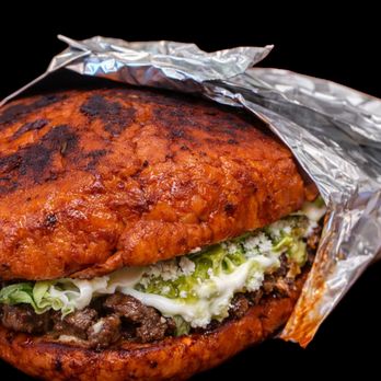 La Doña - pambazo-- bread in guajillo sauce, layered with refried beans, meat, lettuce, sour cream, fresh cheese, salsa, and side of dill jalapeño. - Mexican Near Me - Moxee, Washington La Doña - pambazo-- bread in guajillo sauce, layered with refried beans, meat, lettuce, sour cream, fresh cheese, salsa, and side of dill jalapeño. - Mexican Near Me - Moxee, Washington
