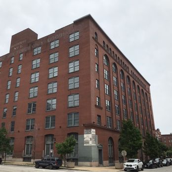 Stadium Lofts - Historic Romanesque Revival warehouse architecture, distinguished by its arched windows and massive red brick façade. - Apartments Near Me - Saint Louis, Missouri Stadium Lofts - Historic Romanesque Revival warehouse architecture, distinguished by its arched windows and massive red brick façade. - Apartments Near Me - Saint Louis, Missouri
